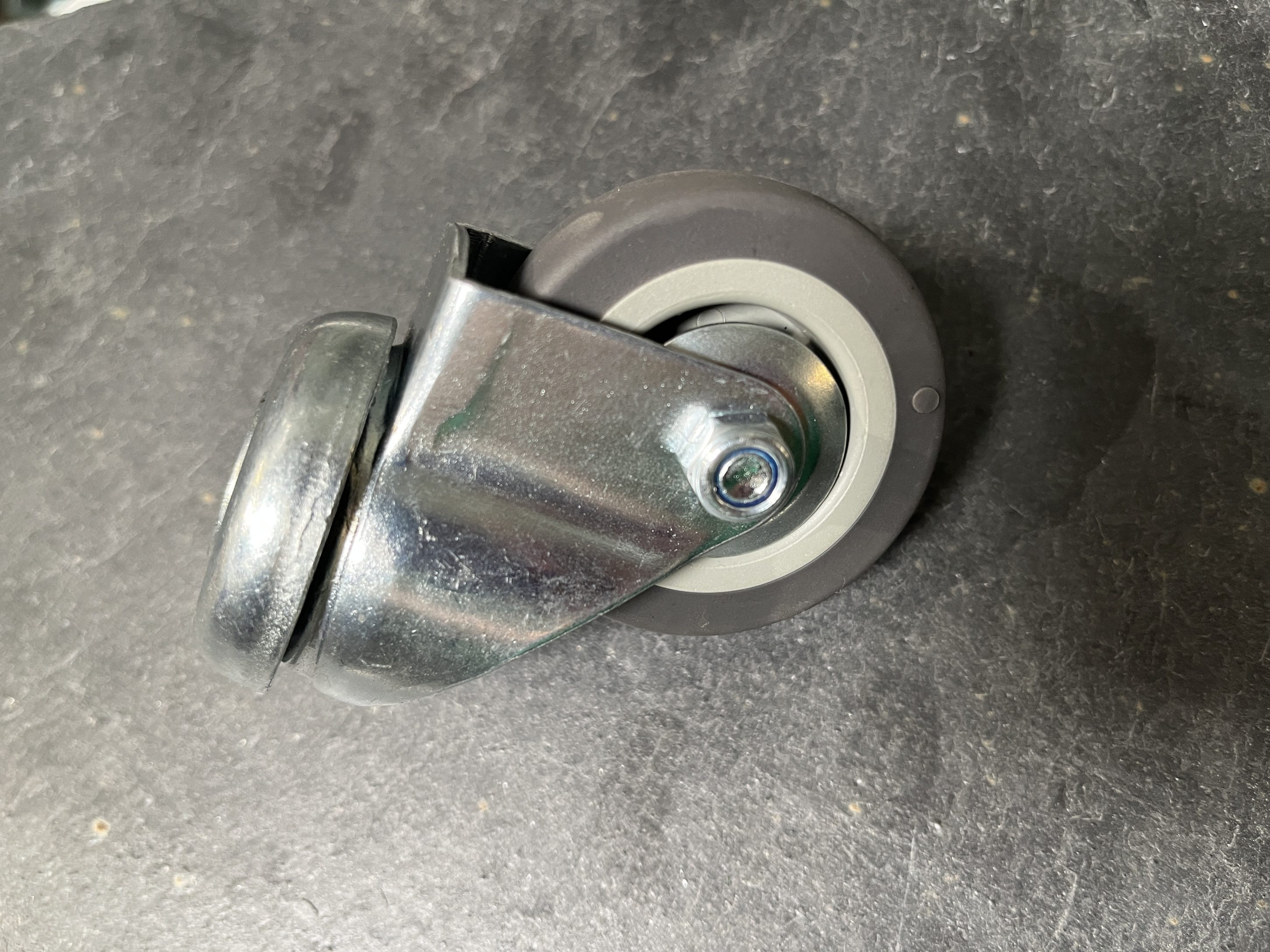 ROULETTE CAOUTCH. D50 GRIS A OEIL